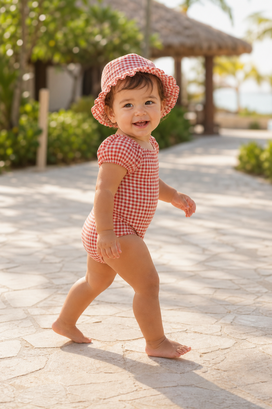 Gentle Nest model hero — Puffy Sleeve Swimsuit & Sun Hat Set, worn by Sofia (GN-T04)