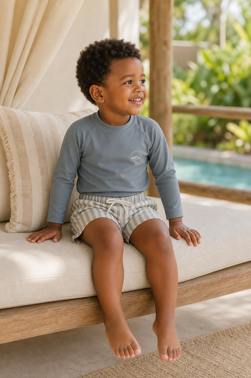 Gentle Nest model hero — Striped Gray Long Sleeve Swim Set, worn by Malik (GN-T06)