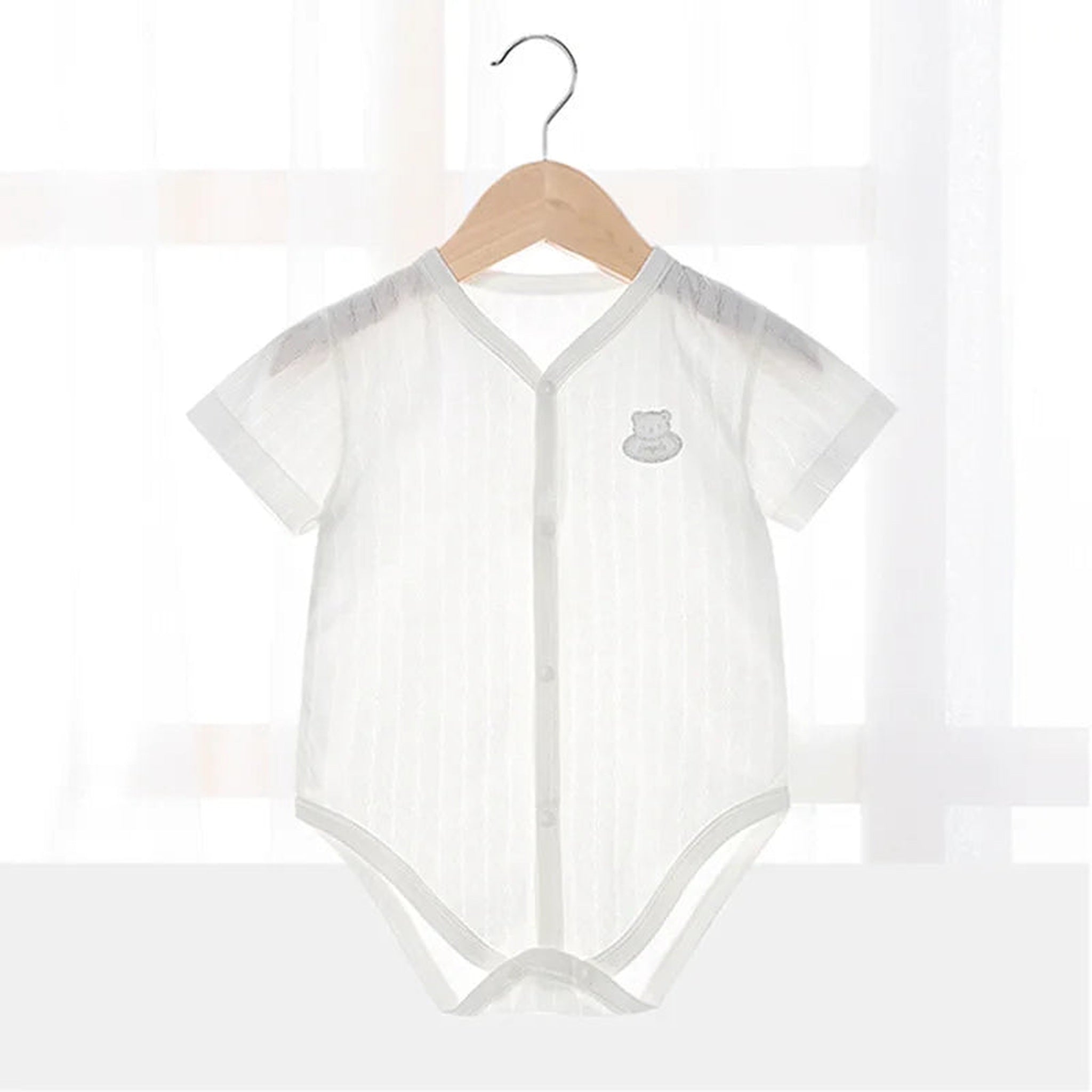 White knit short sleeve bodysuit
