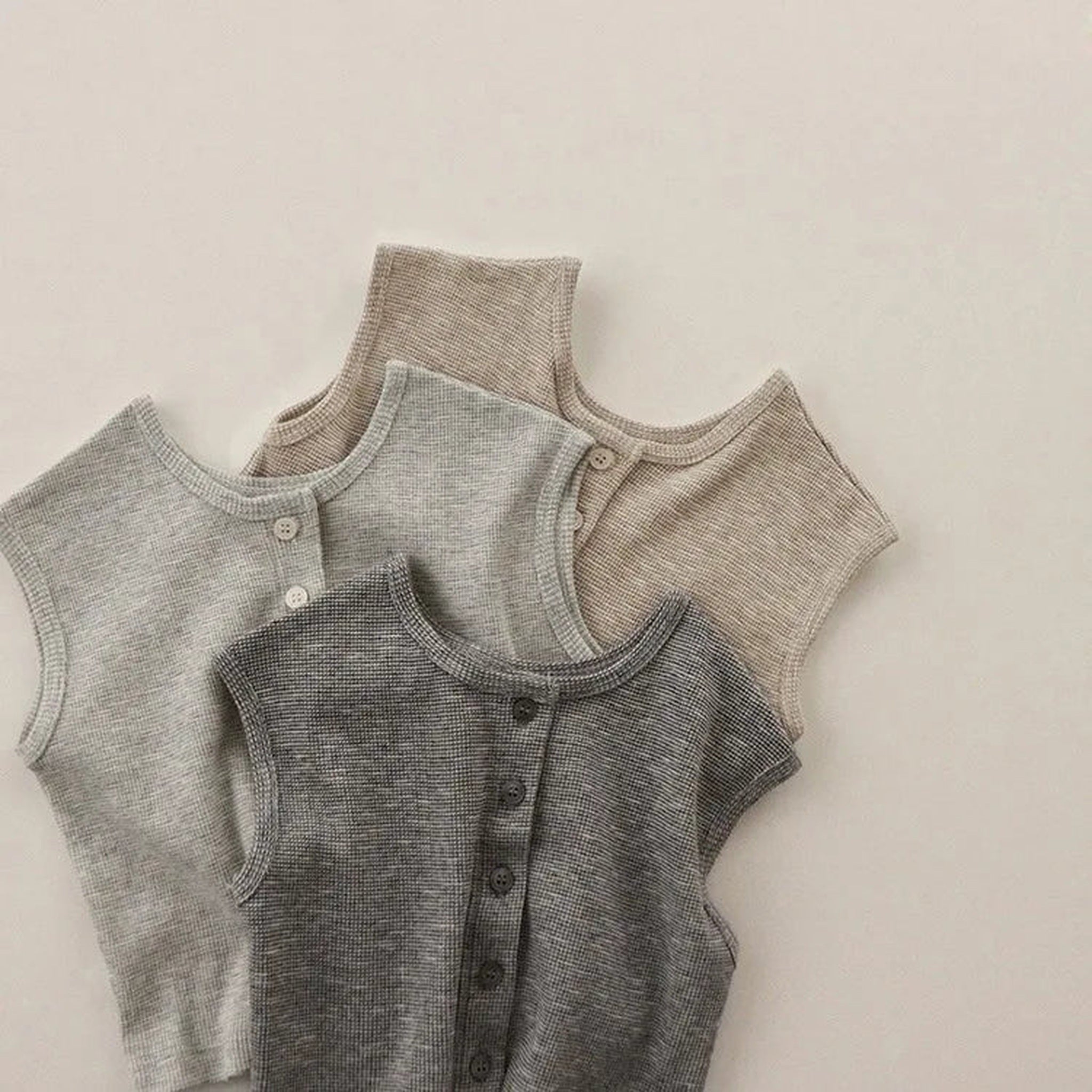 Button detail on sleeveless outfit set tops
