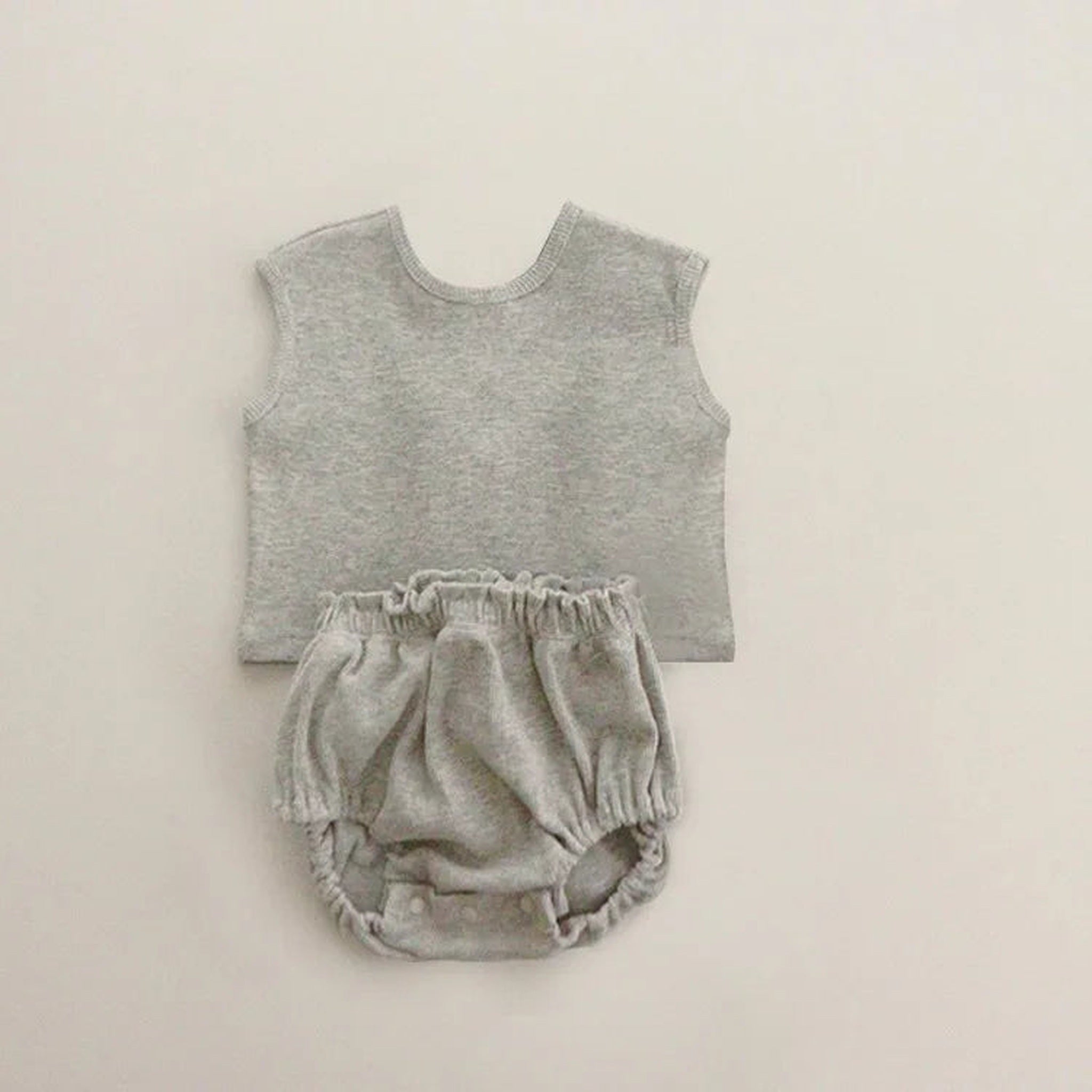 Light gray sleeveless outfit set with bloomer bottoms
