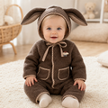 Gentle Nest model hero — Plaid Bunny Hat Romper, Coffee, worn by Clara (GN-B04)