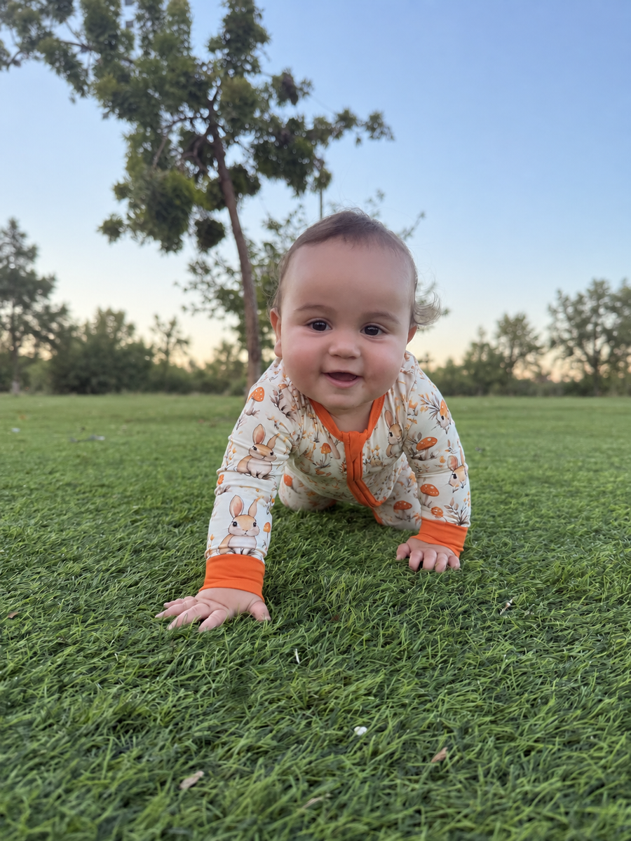 Jordan modeling the Autumn Bunny Romper by GentleNest Co.