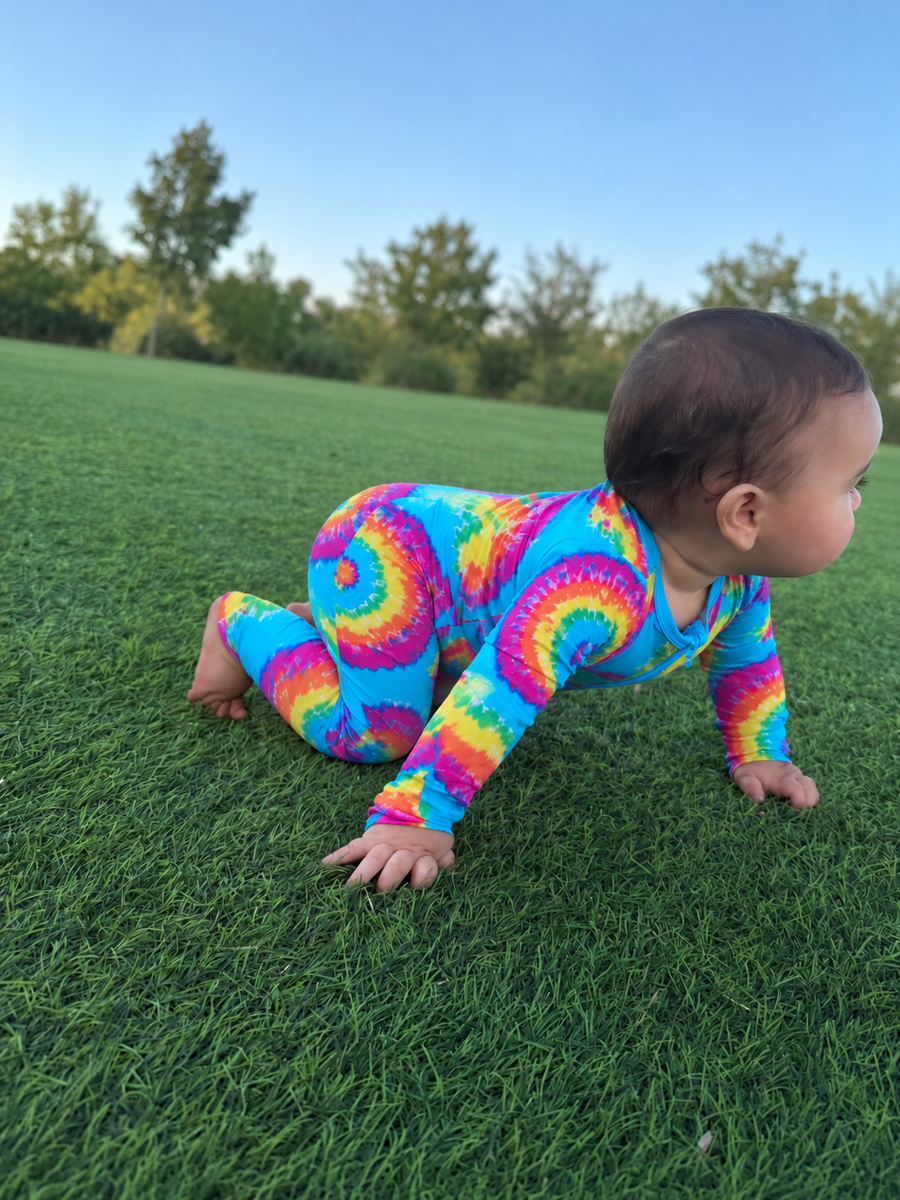 Jordan modeling the Electric Paisley Romper by GentleNest Co.