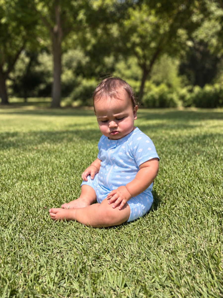 Jordan wearing the Blue Clouds Shortie Romper