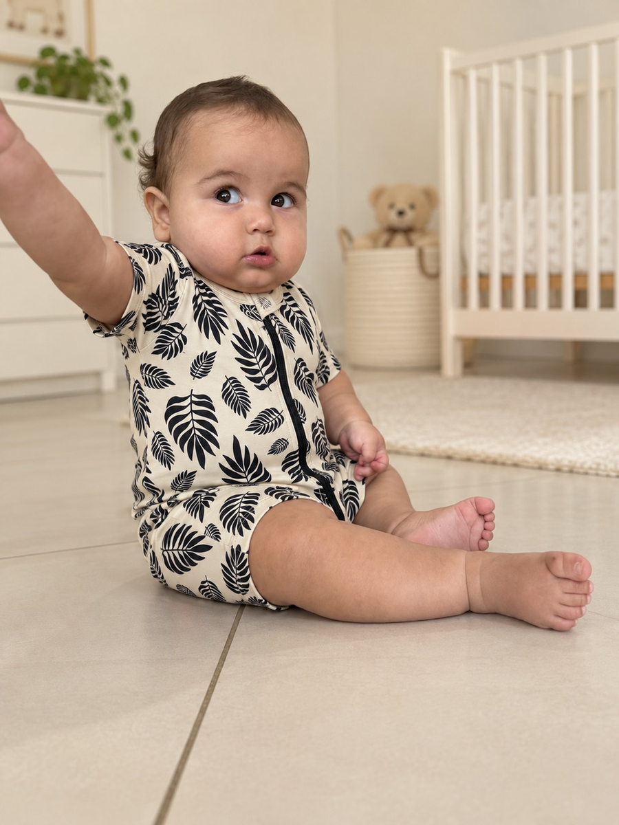 Jordan wearing the Botanical Leaves Shortie Romper
