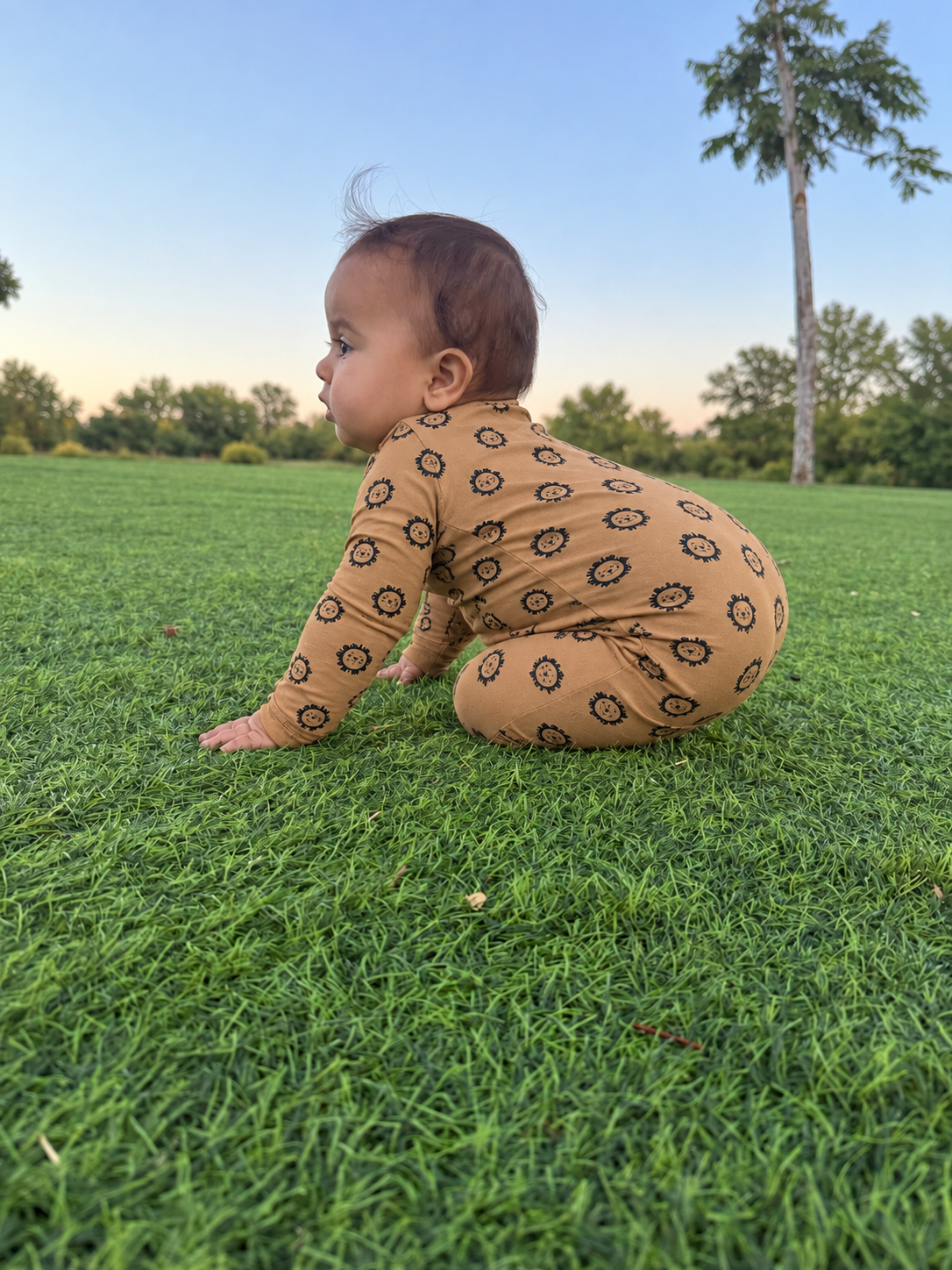 Jordan modeling the Lion Faces Romper by GentleNest Co.