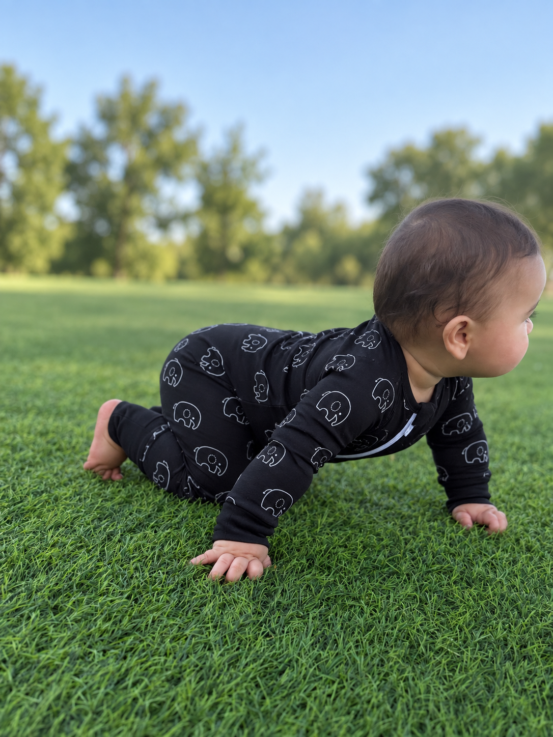 Jordan modeling the Midnight Elephants Romper by GentleNest Co.