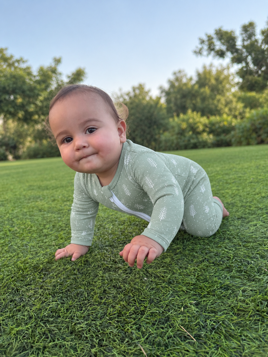 Jordan modeling the Sage Sprigs Romper by GentleNest Co.