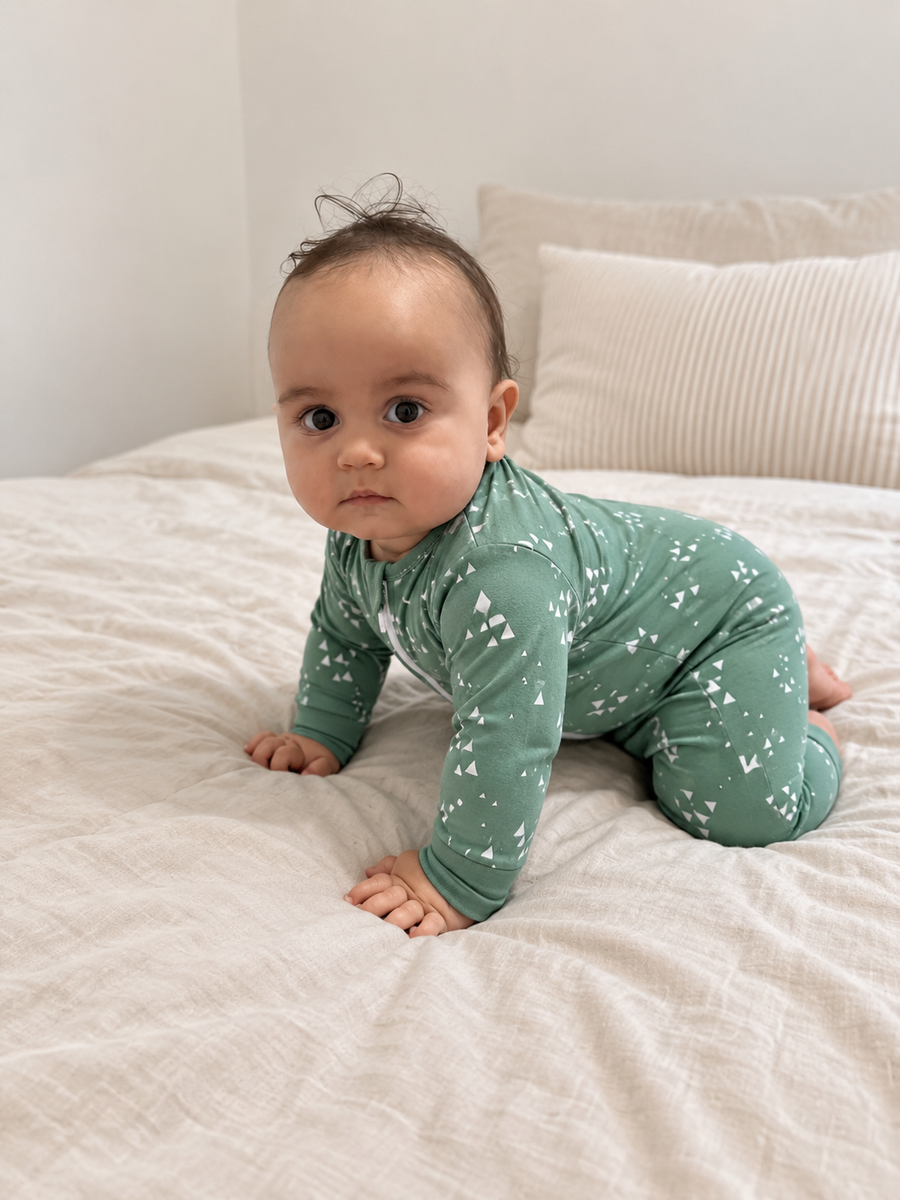 Jordan modeling the Sage Trees Romper by GentleNest Co.