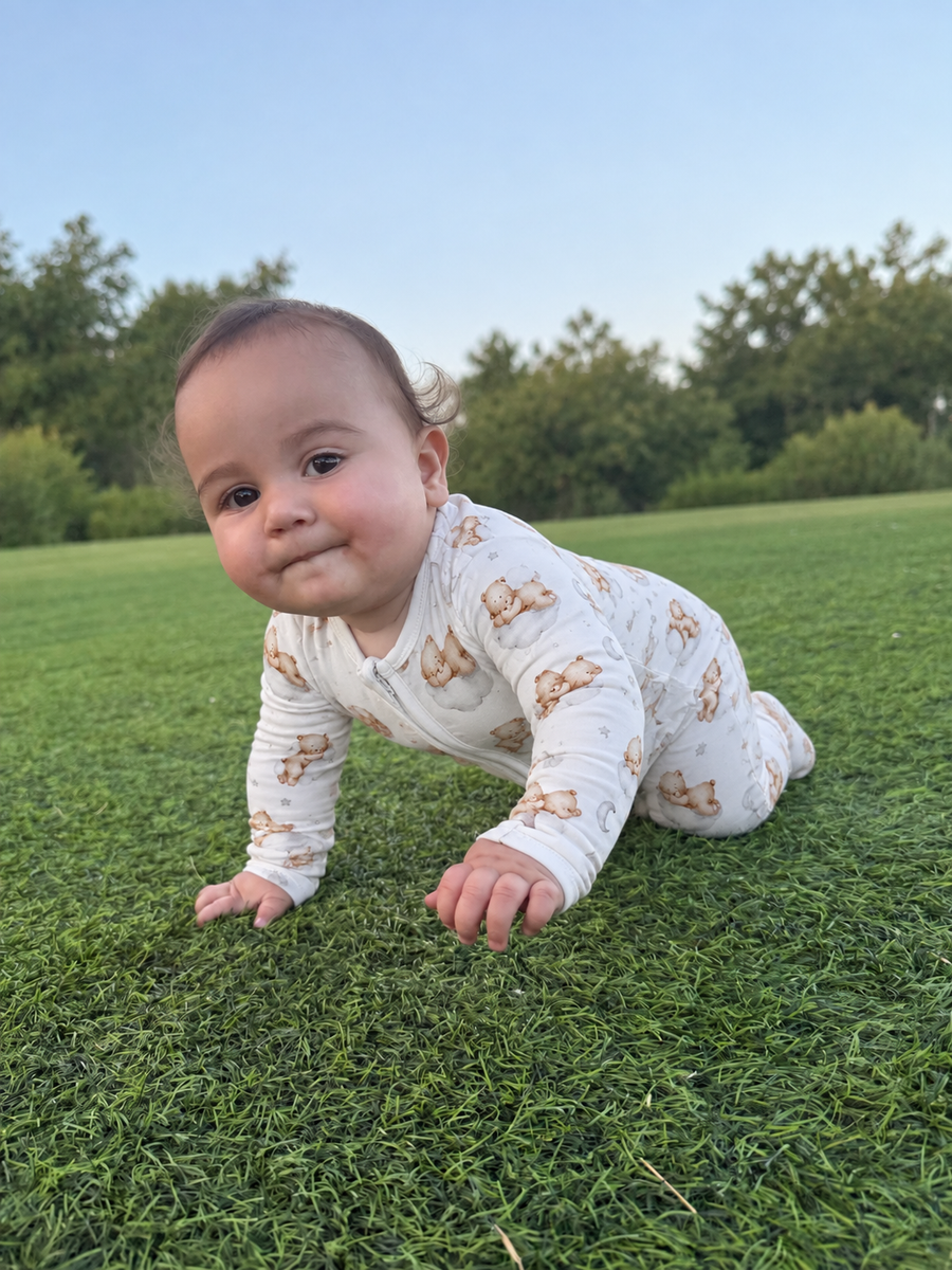 Jordan modeling the Sleeping Bears on Clouds Footed Romper by GentleNest Co.