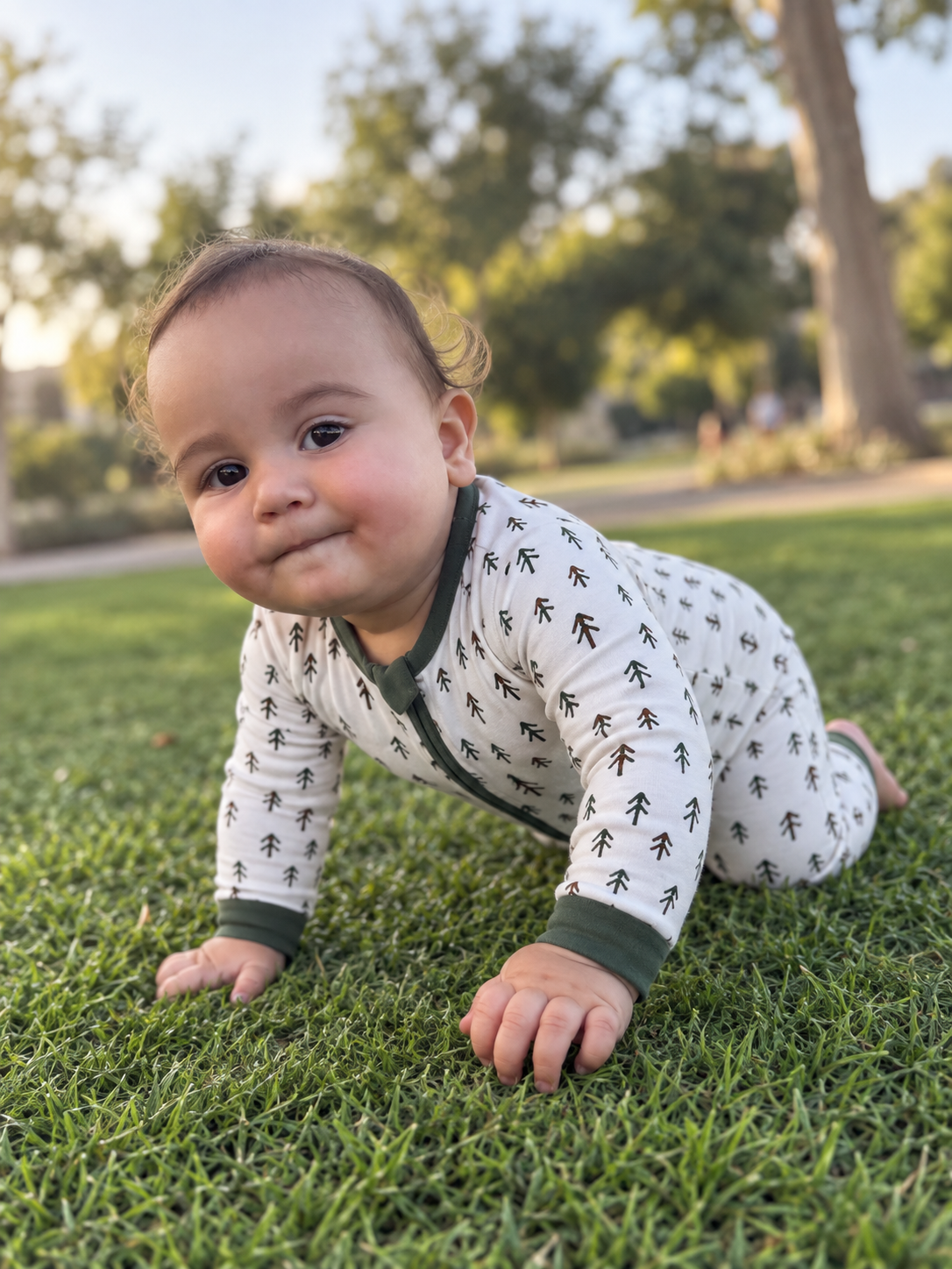 Jordan modeling the Tiny Pines Romper by GentleNest Co.