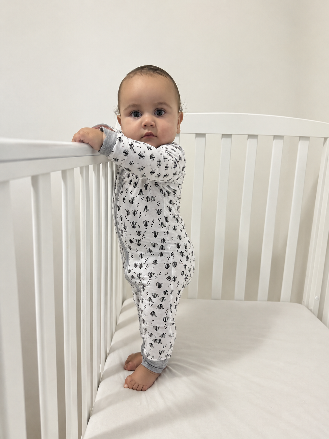 Jordan modeling the Tiny Trees Romper by GentleNest Co.