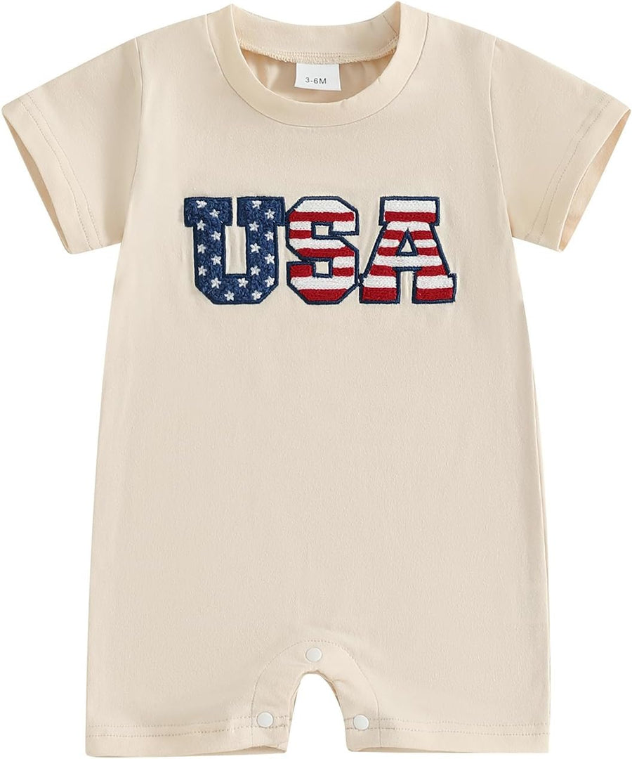 Beige short-sleeve baby romper with embroidered USA appliqué and snap closure