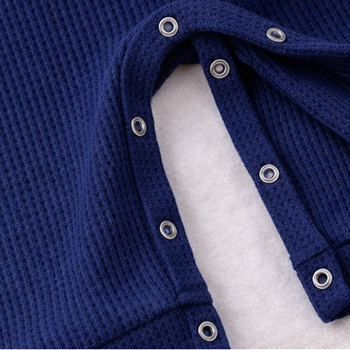 Collage of a blue textured garment with buttons and a pocket.