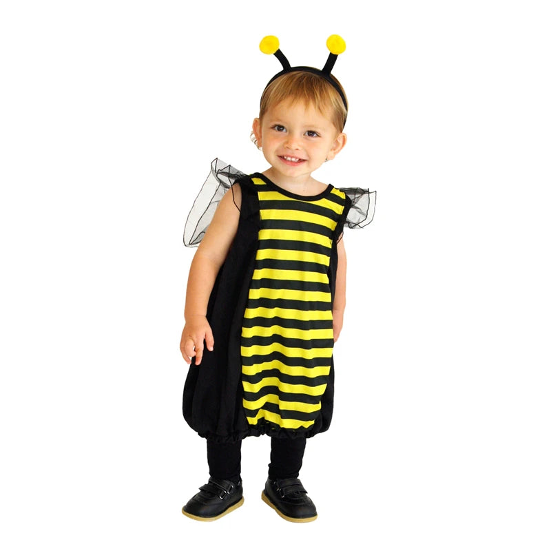 Toddler standing in bumblebee costume with antenna headband