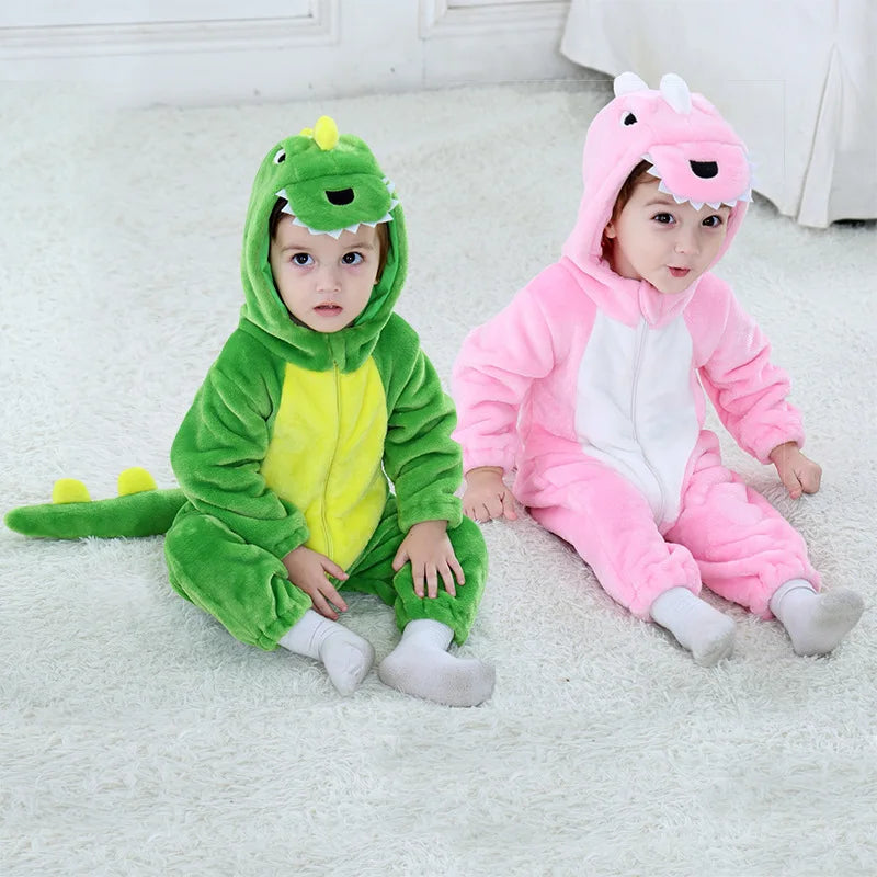 Pink and green dinosaur plush jumpsuit costumes worn by toddlers