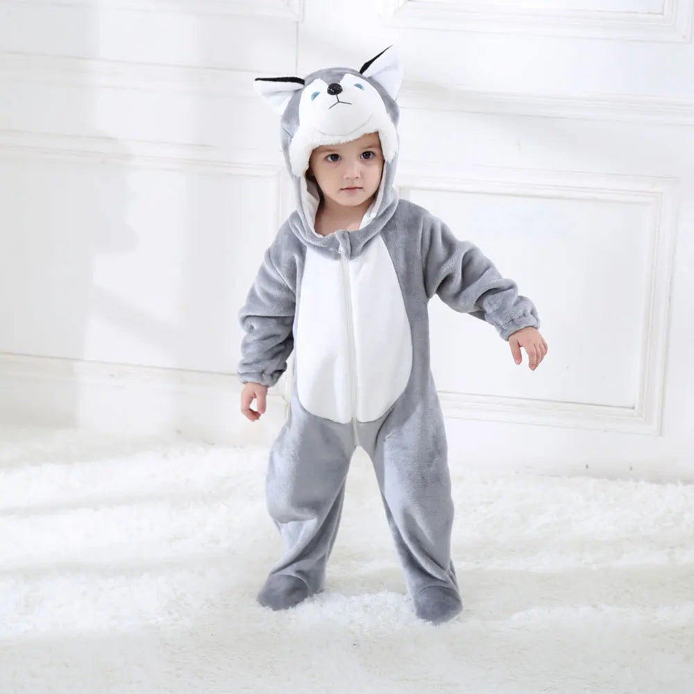 Toddler standing in husky dog costume romper