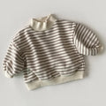 Close-up of striped velvet hoodie sweatshirt fabric and design