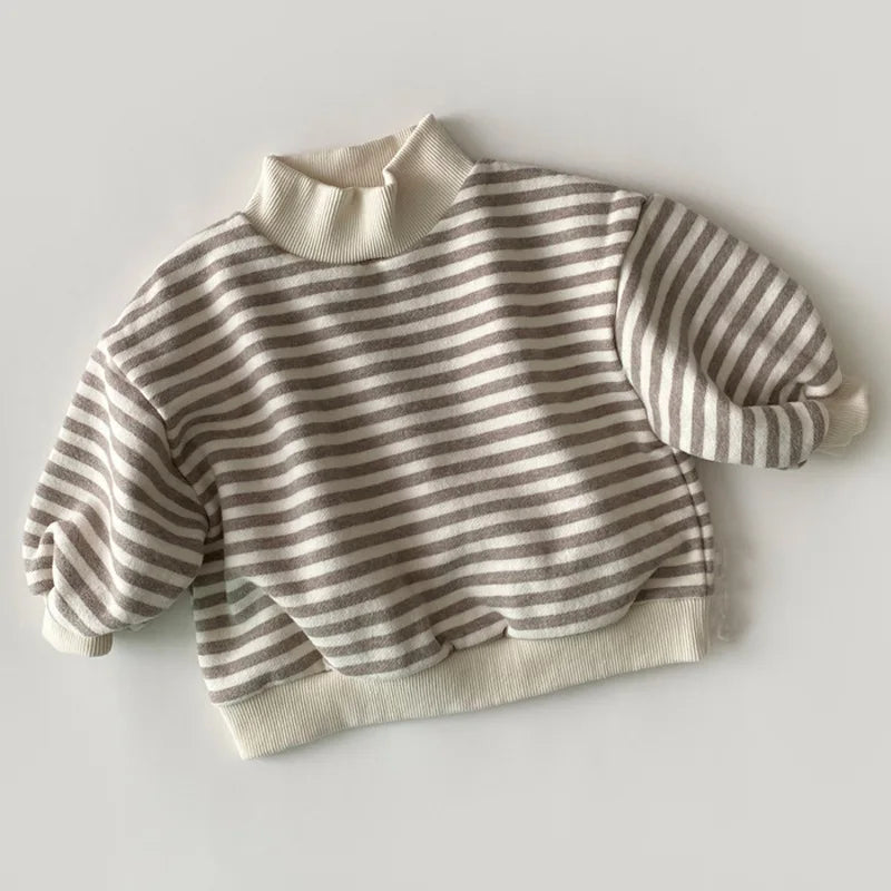 Close-up of striped velvet hoodie sweatshirt fabric and design