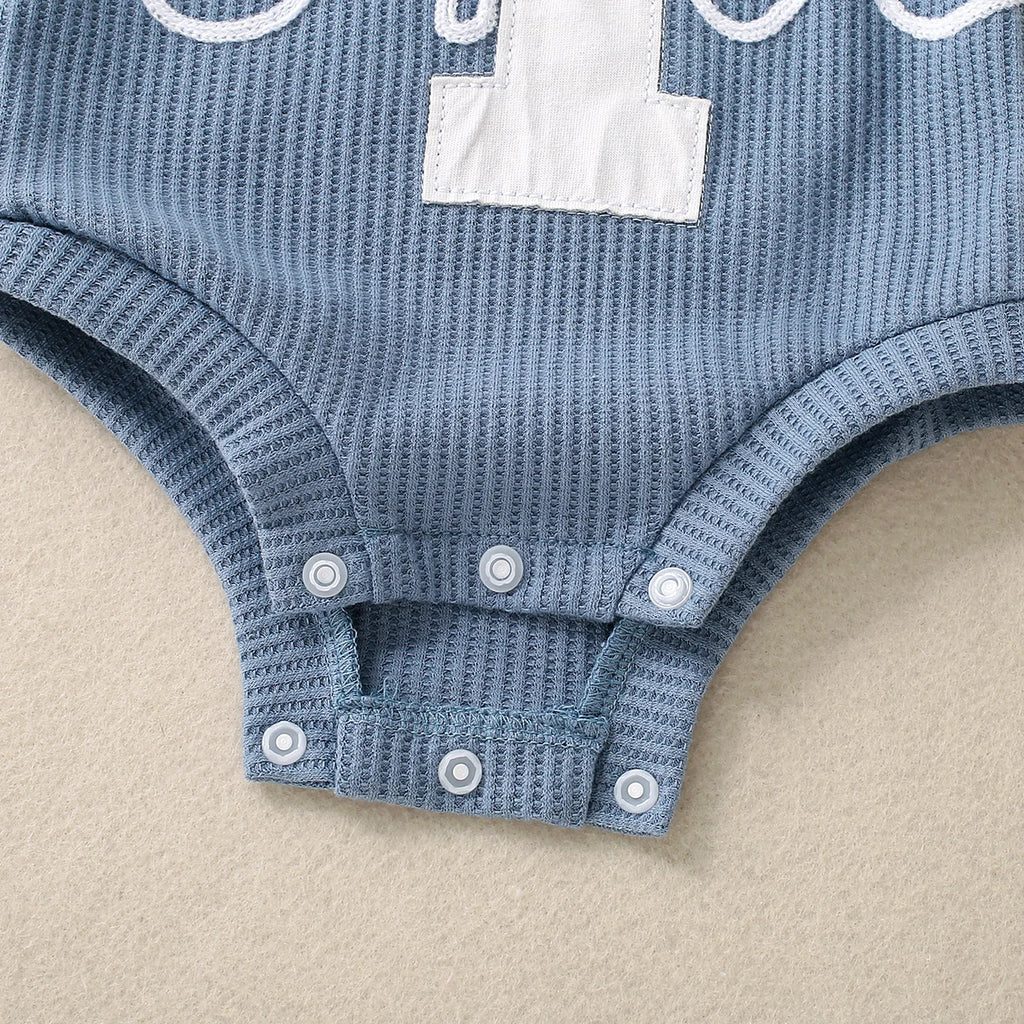 Back view of Embroidered Triangle Romper in Sky Blue