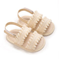 Cream Pom-Pom soft sole baby sandals