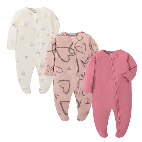 Solid white footed baby romper with long sleeves and zipper closure