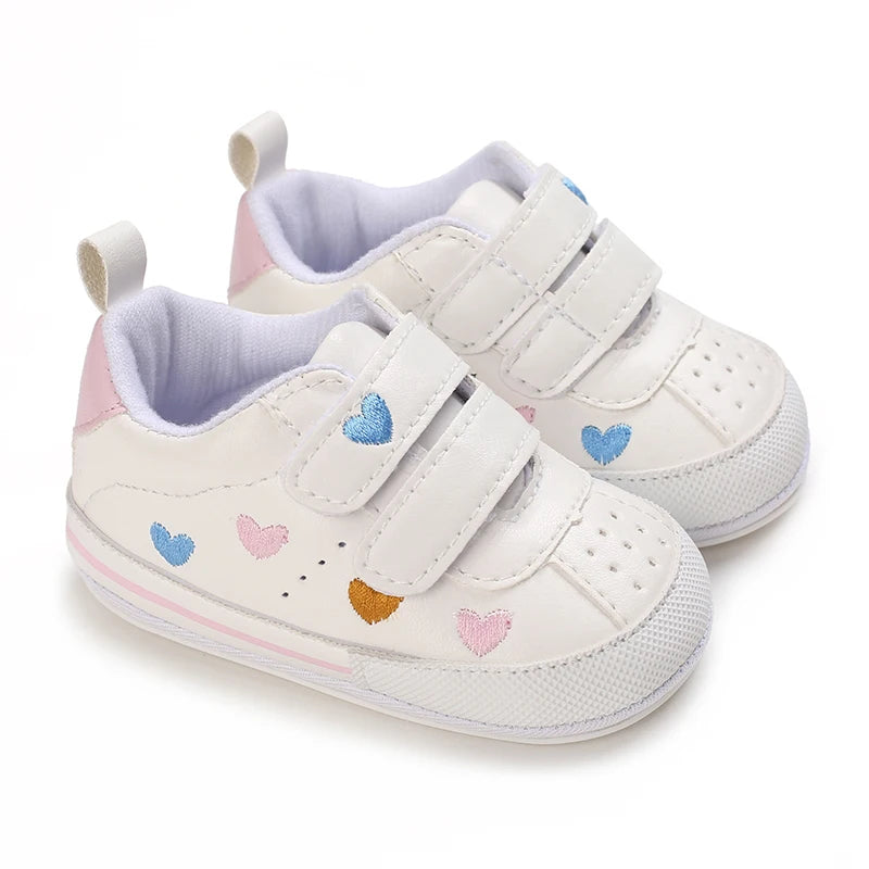 Multicolor Heart Velcro baby sneakers, angled pair view
