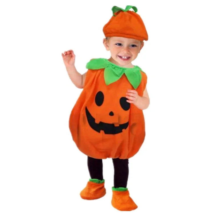 Baby wearing orange pumpkin bubble costume with jack-o'-lantern face, green leaf collar, matching hat, and booties