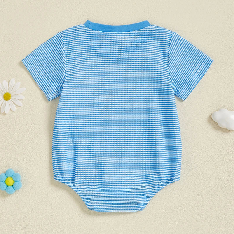 Close-up of embroidery detail on baby bodysuit