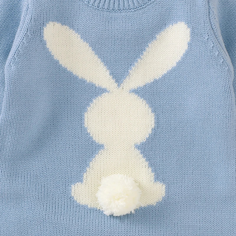 Side view of knitted rabbit baby romper with long sleeves