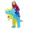 Child wearing blue and yellow inflatable dinosaur costume with horns and frill