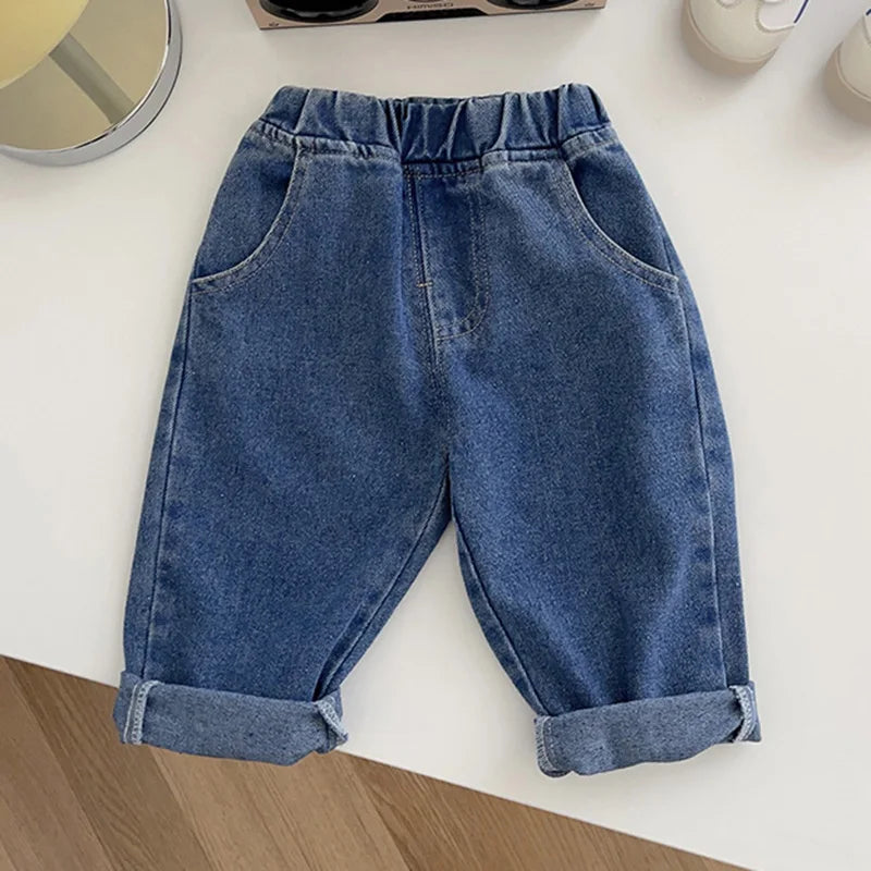 Blue cuffed denim pants with elastic waist and curved front pockets