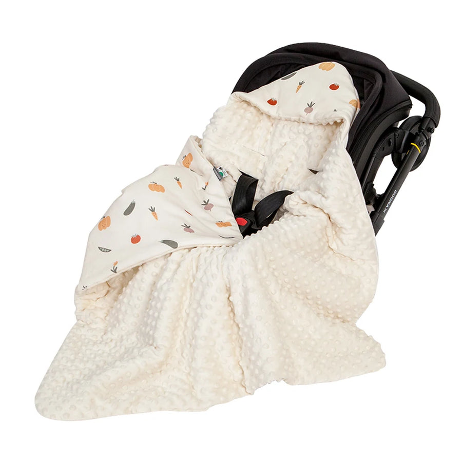 Windproof Hooded Baby Blanket draped over car seat