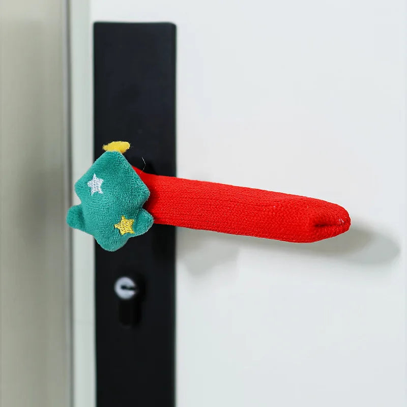Red fabric door handle cover with a Christmas tree design