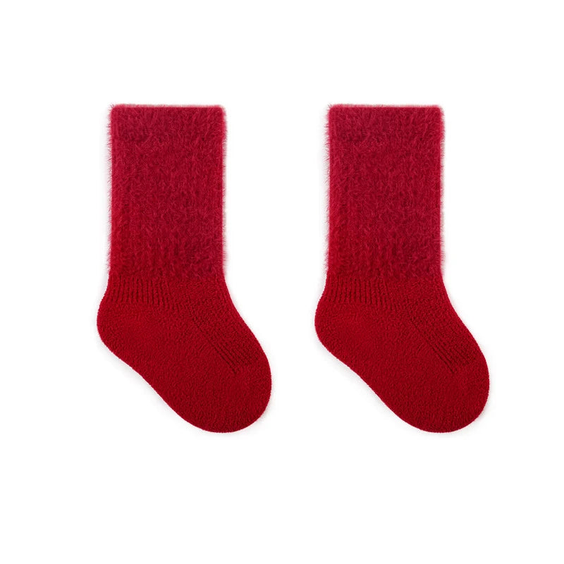 Plain cranberry red socks shown as a pair on a white background.