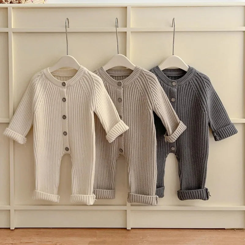 Knitted solid color baby bodysuit in soft fabric