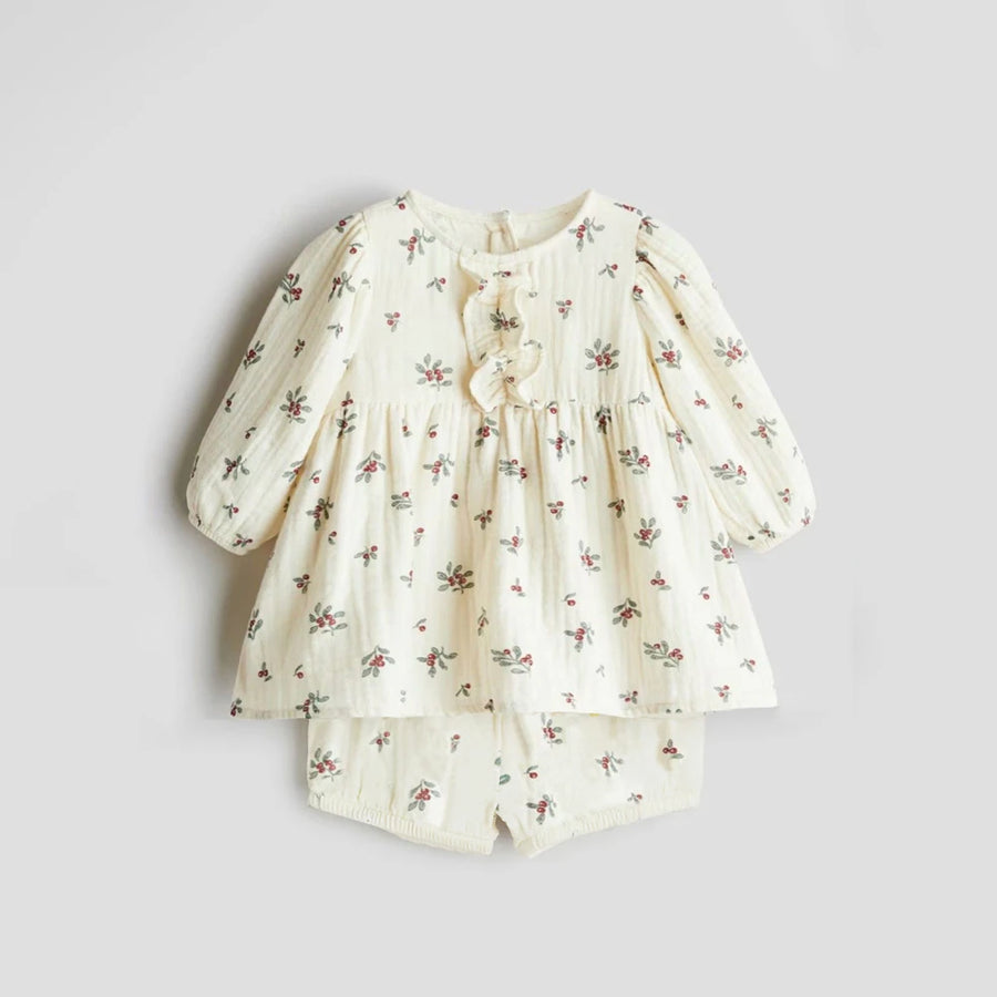 Printed design detail on organic cotton toddler girls clothing set