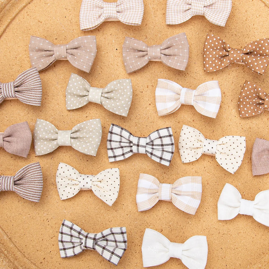 Mini Hair Bow Clips Displayed on White Background