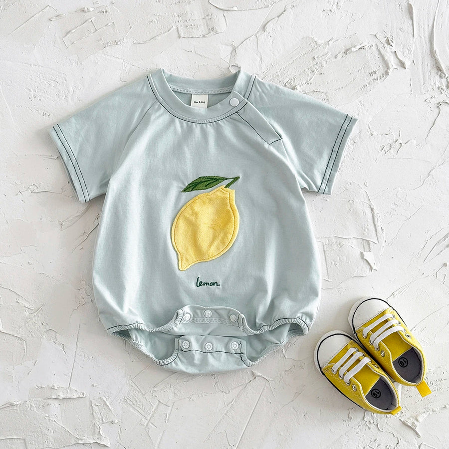 Pale green Fruit Patch Bubble Romper with lemon patch