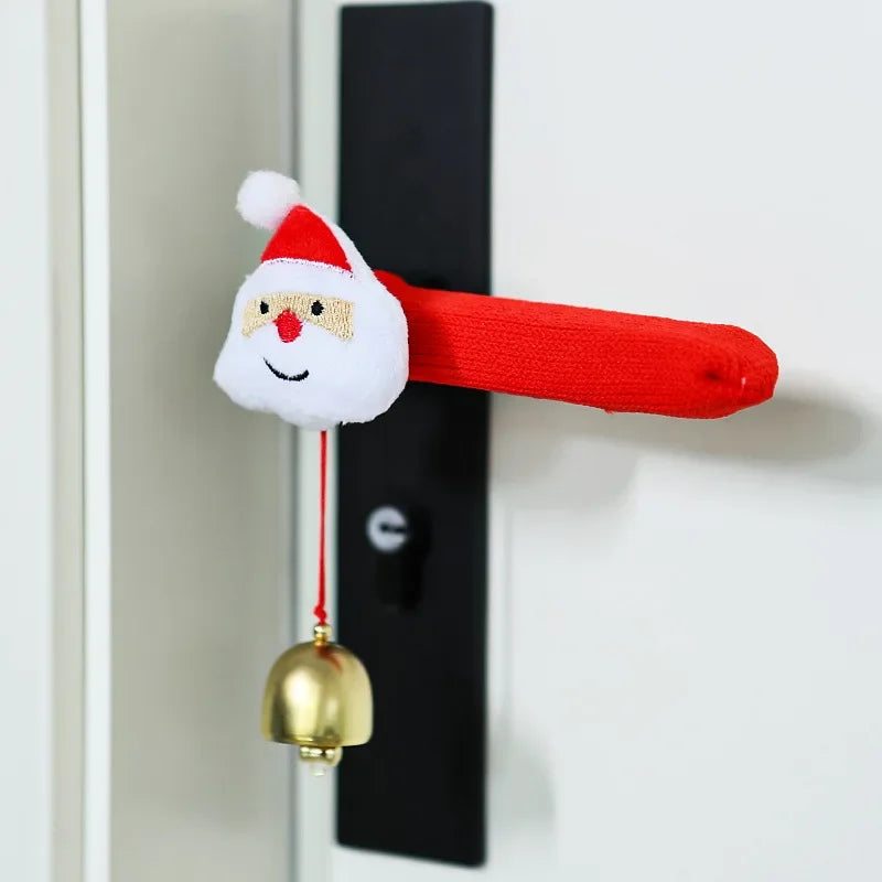 Red fabric door handle cover with a Santa Claus design and hanging bell