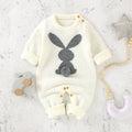 Knitted rabbit baby romper displayed flat