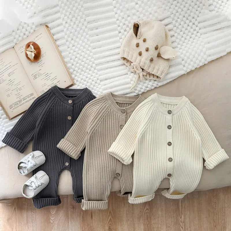 Close-up of knitted texture on baby bodysuit