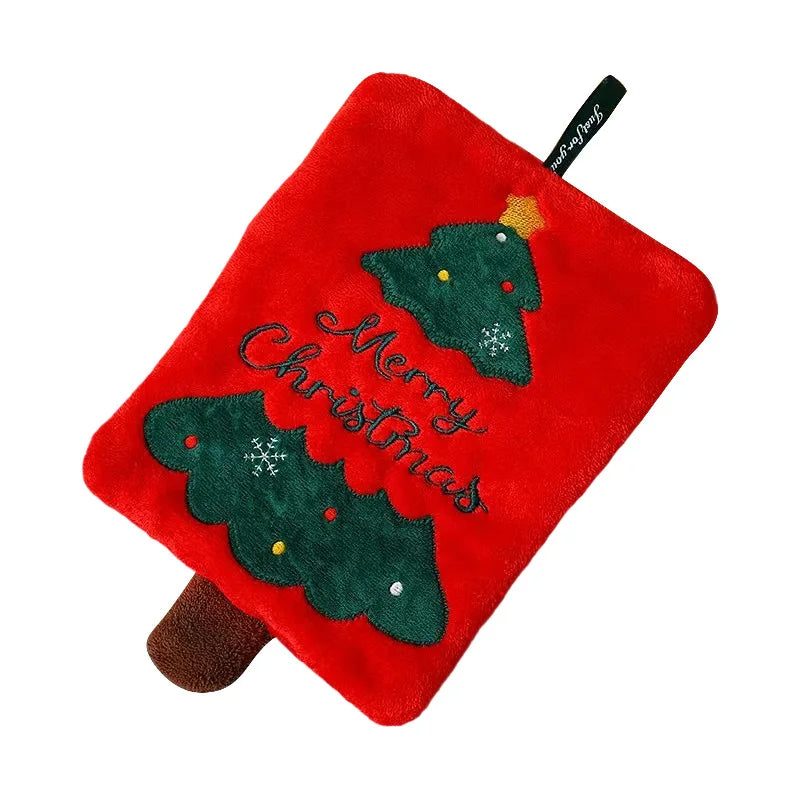 Red hanging hand towel with an embroidered Christmas tree and Merry Christmas lettering