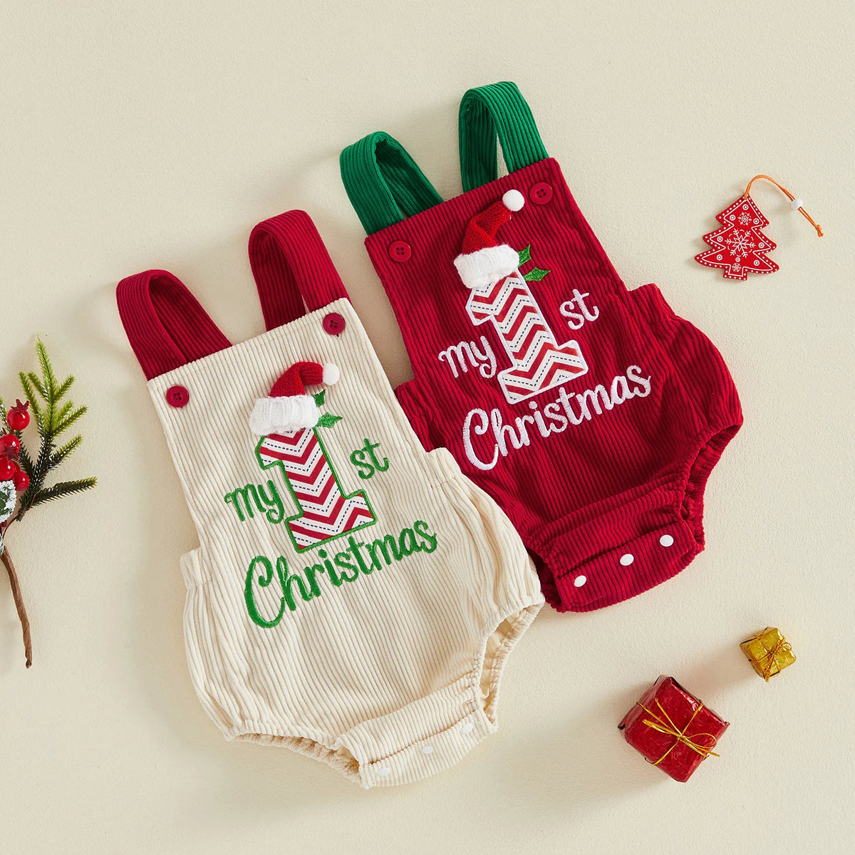 Cream and red ribbed baby overalls with contrasting shoulder straps and My 1st Christmas embroidery.