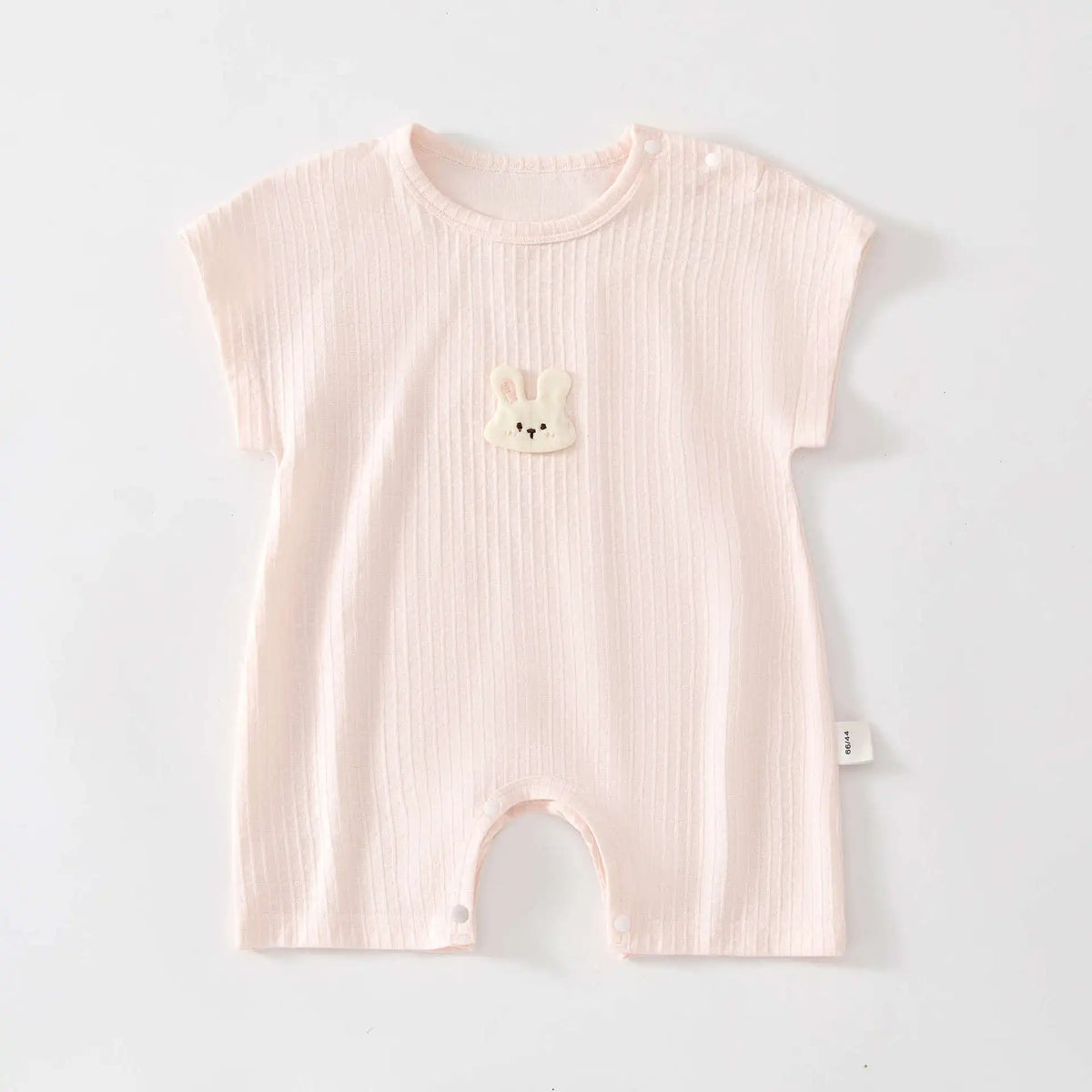 Breathable cotton summer romper for babies with short sleeves and single-breasted closure