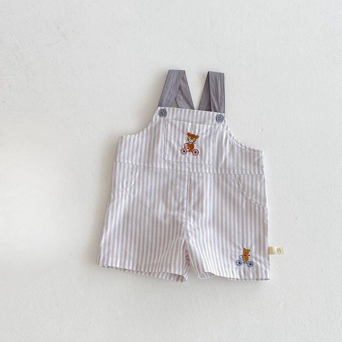 Gray striped short overalls with bear bicycle embroidery