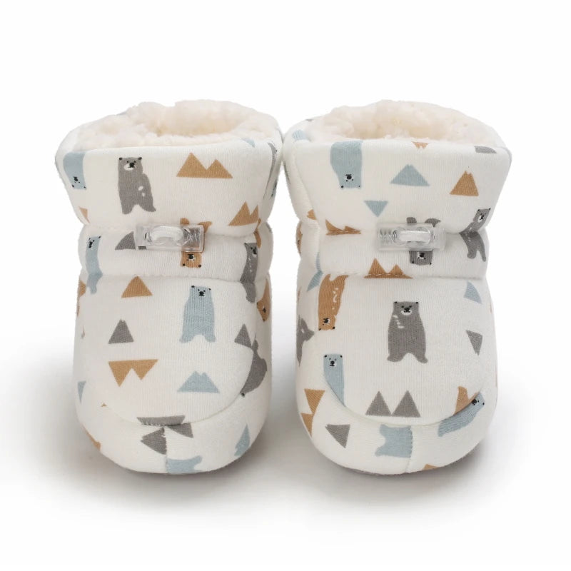 Winter baby boots featuring cute cartoon patterns and warm fabric