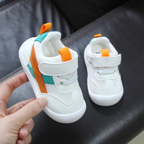 Pair of orange Airy Step breathable baby shoes