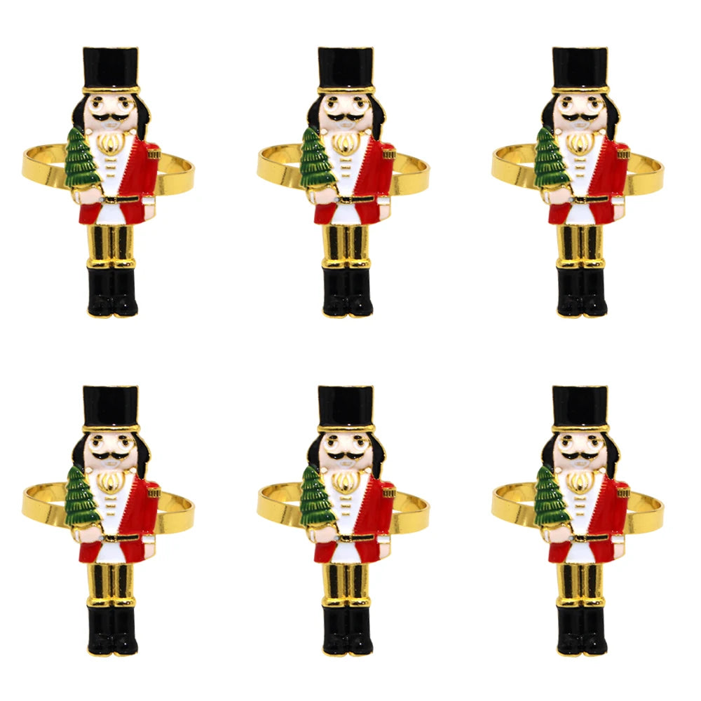 Black Hat Christmas Nutcracker Napkin Rings — Set of 6. A nutcracker with a tall black hat, red jacket, and green drum.